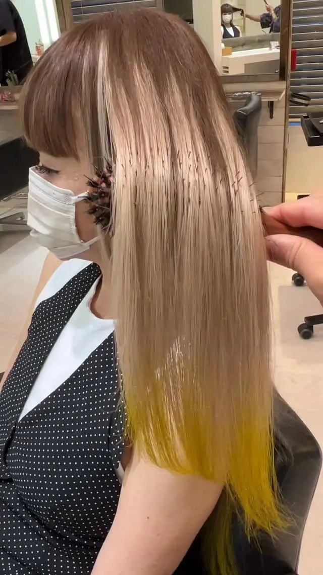 担当